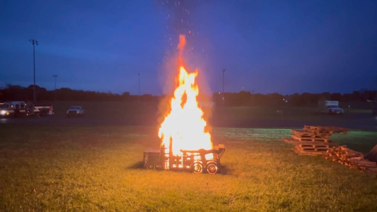 Roaring bonfire at dusk during the Fall Fused community event in Winthrop Harbor